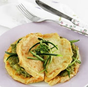 Omelette au curry fourrée à la crème de courgettes